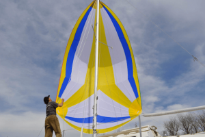 yellow white and blue symmetrical spinnaker