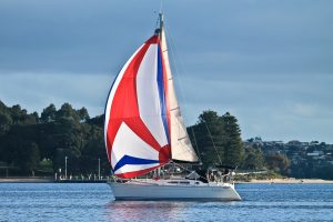 asymmetrical cruising spinnaker on Jeanneau Odyssey 32.2 in Australia