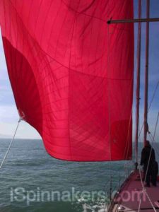 red asymmetrical spinnaker spinnaker 1969 sq ft on boat made by owner