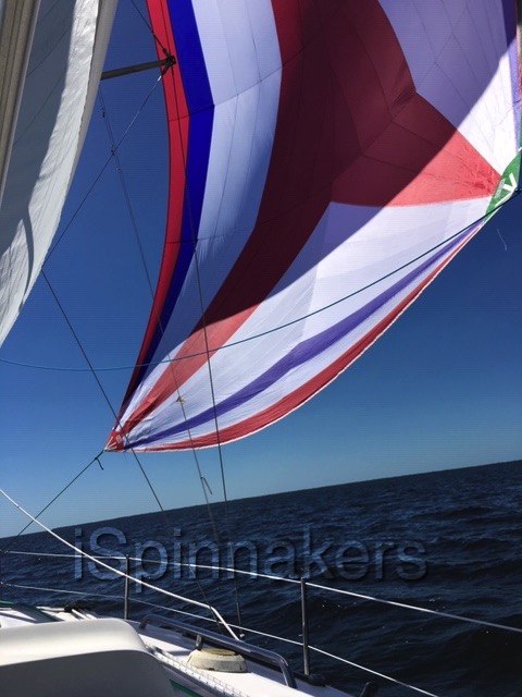 Hunter 32 2 2004 with tricolor asymmetrical spinnaker